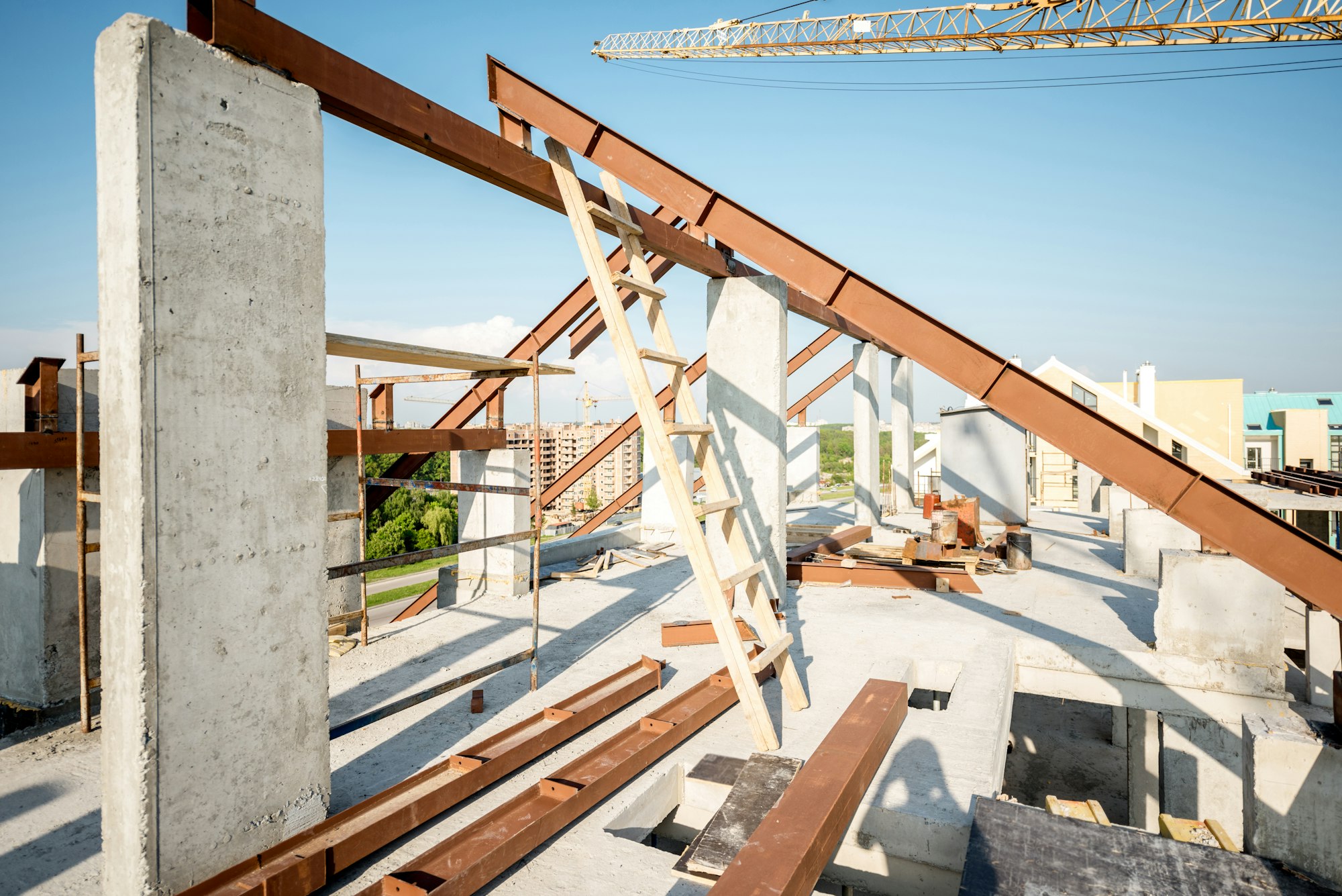 Roof part with metal beams on the construction site